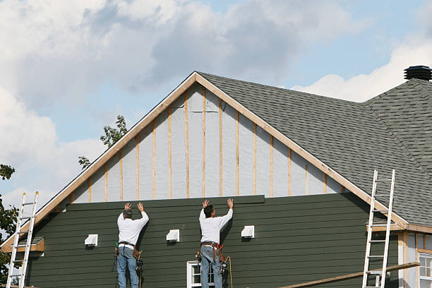 Professional Siding Contractor technician working in Roxboro, NC
